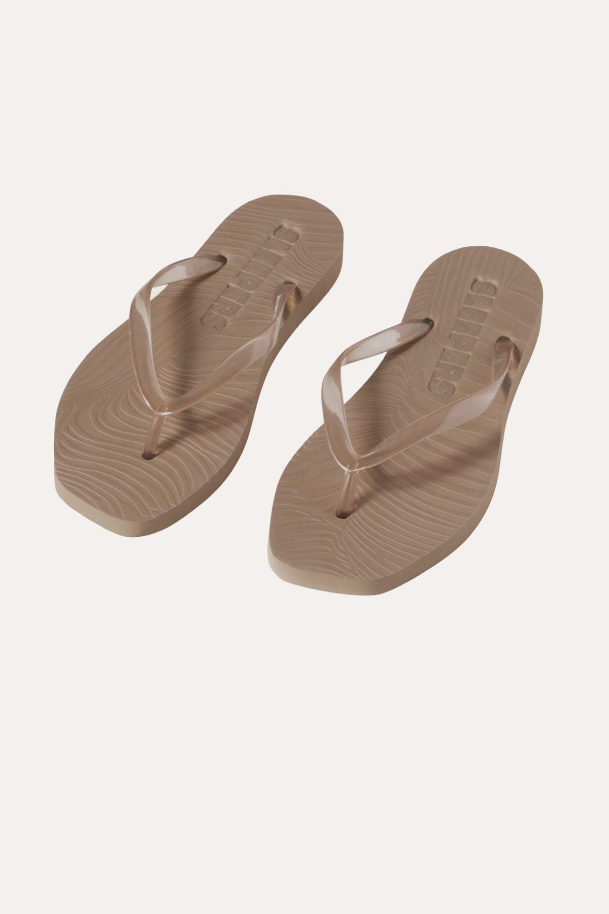 Tapered- Sand trans Flip Flops