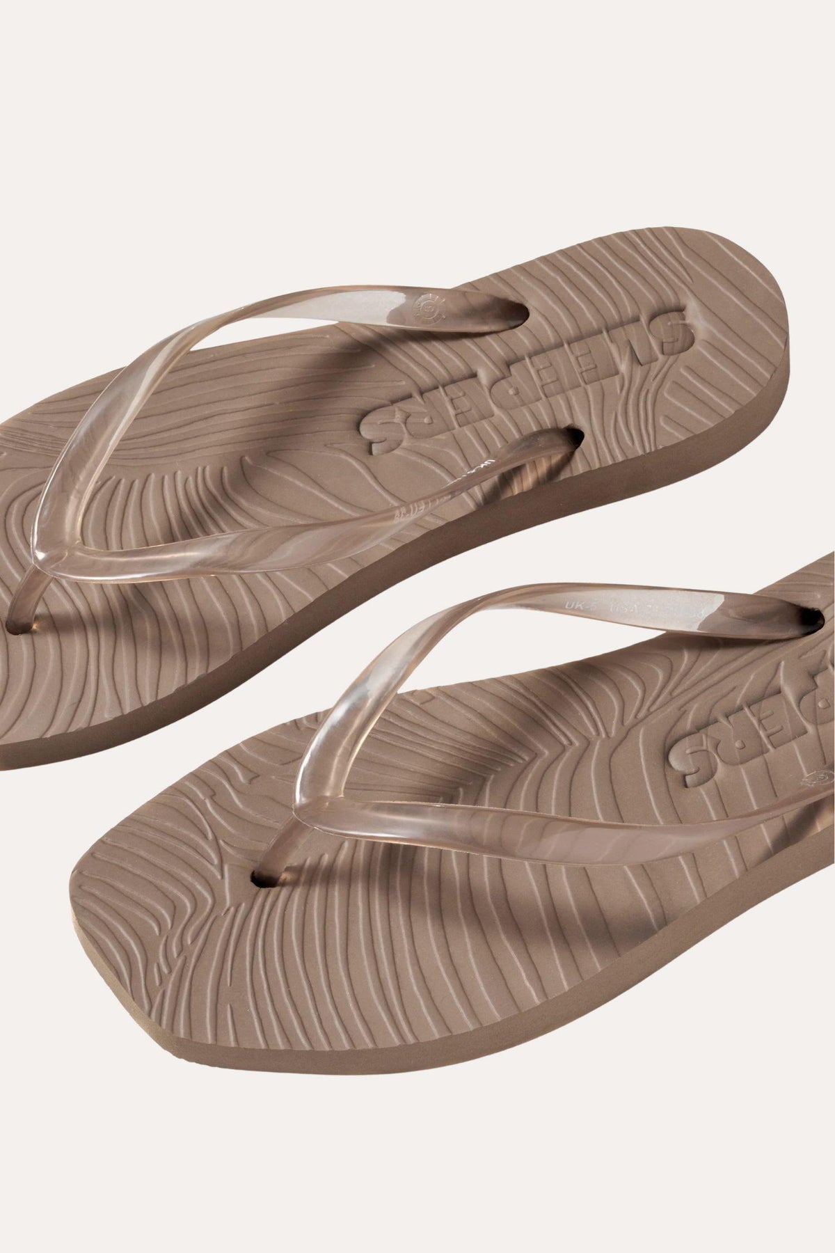 Tapered- Sand trans Flip Flops